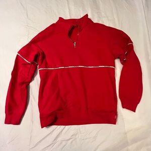 Gently used men’s red Supreme quarter zip sweatshirt, size medium